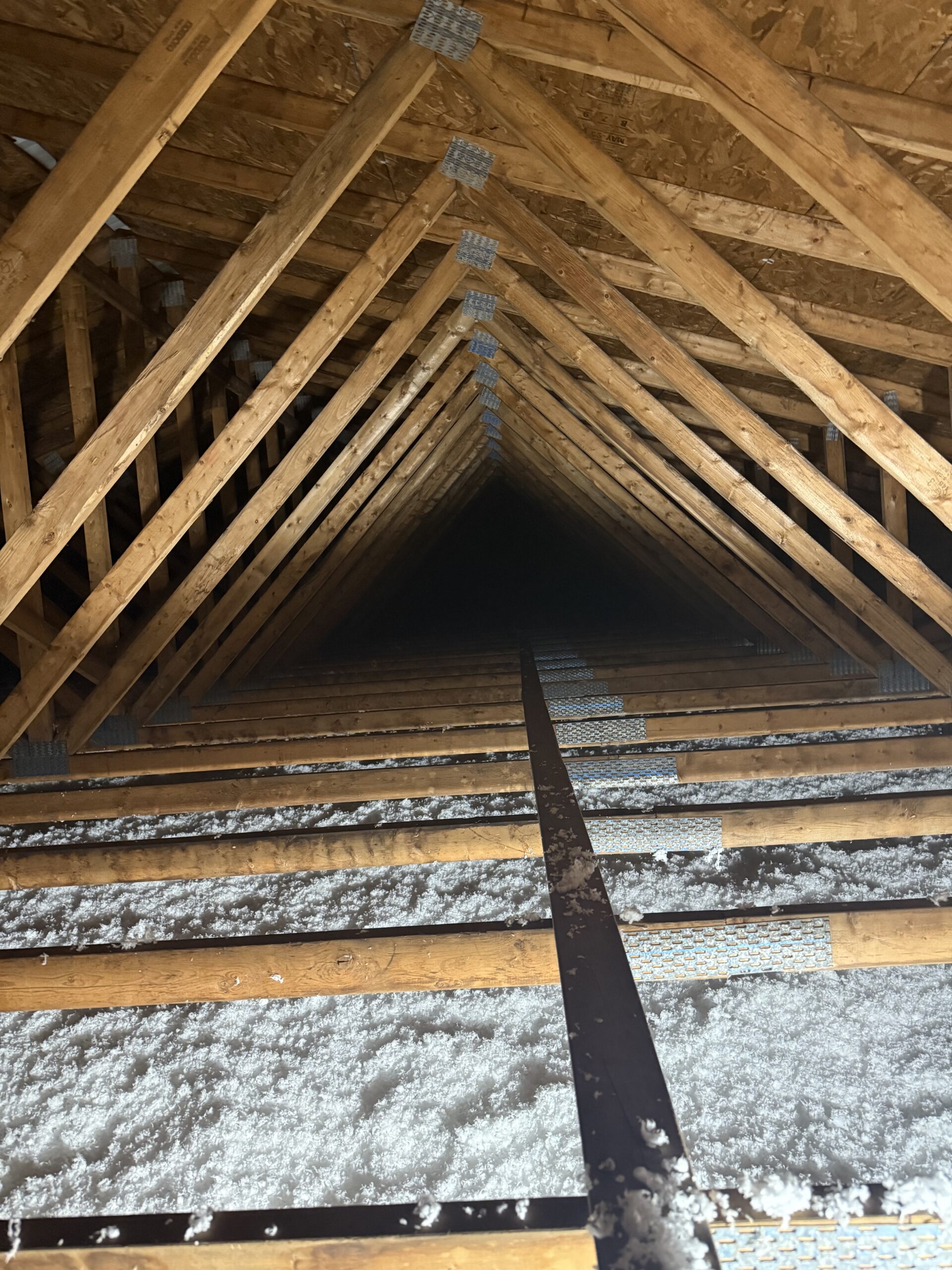 blow in fiberglass insulation installed in attic