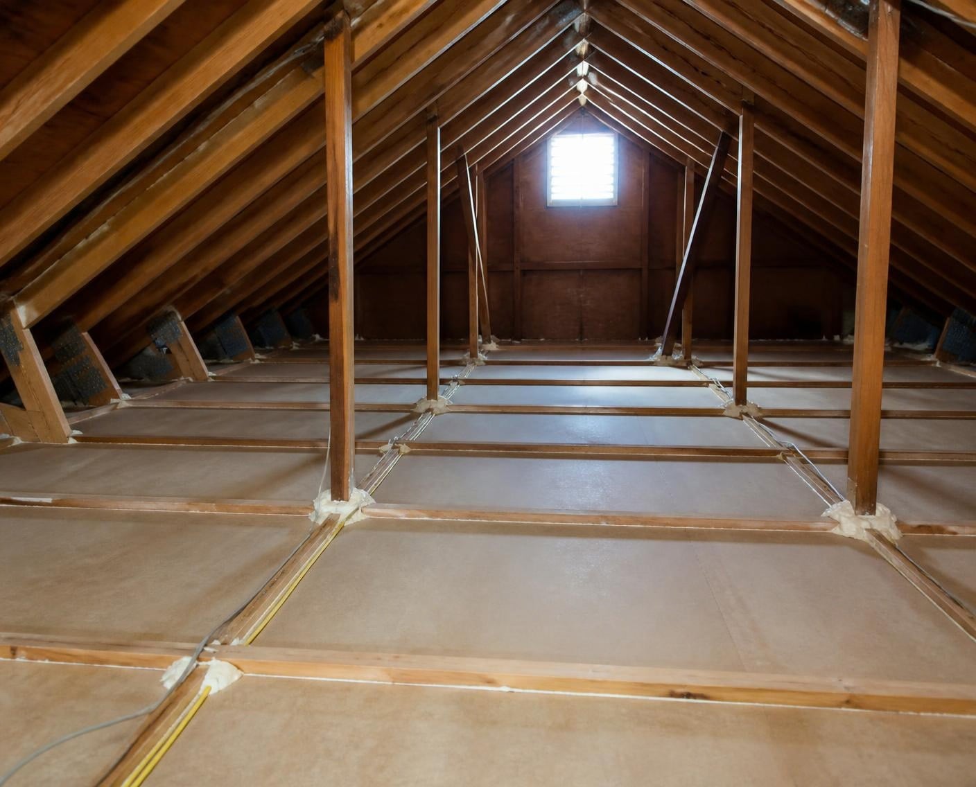 Attic cleared to the joists and air sealed, ready for new insulation