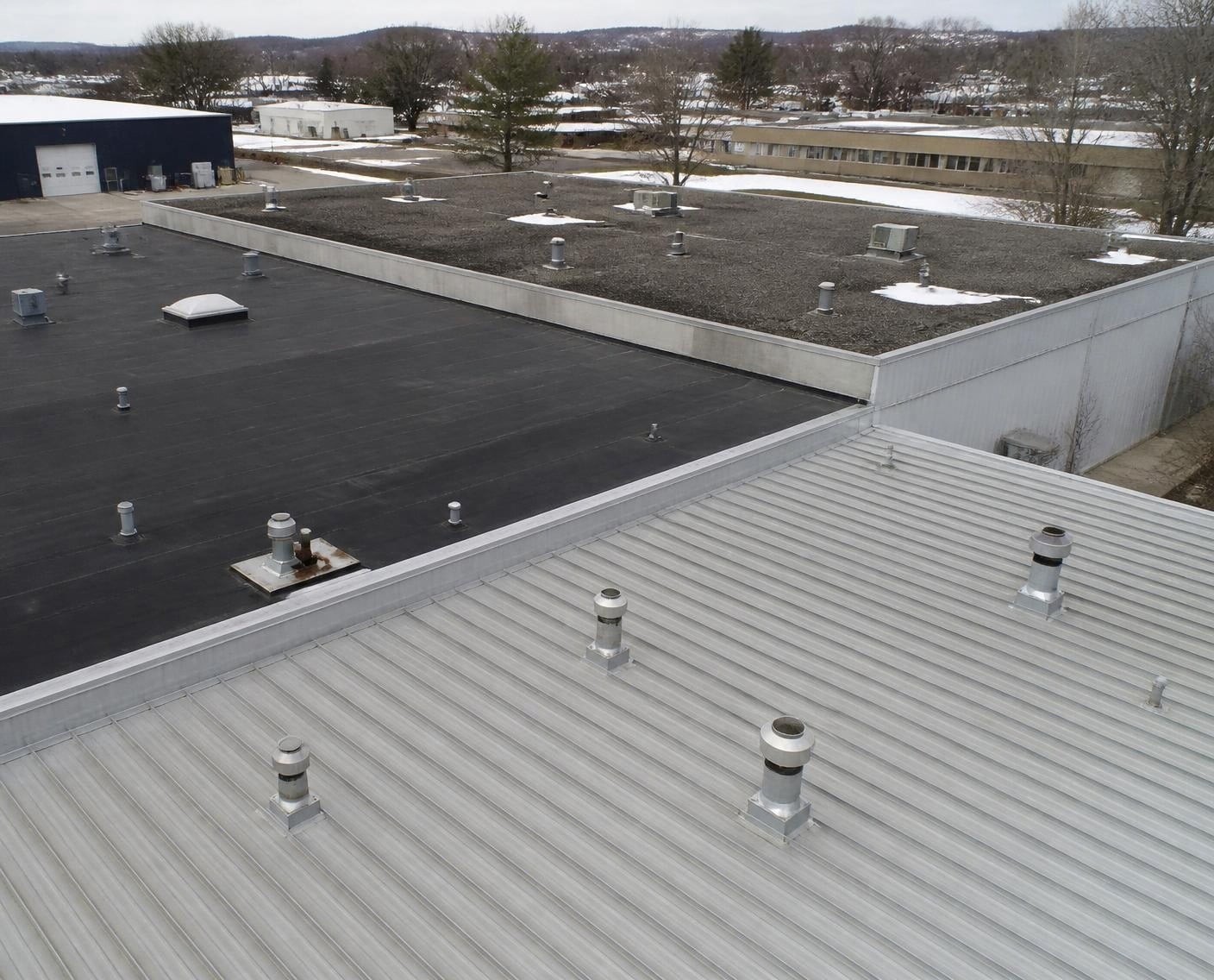 Metal, membrane and built-up roofs side by side, all coating candidates